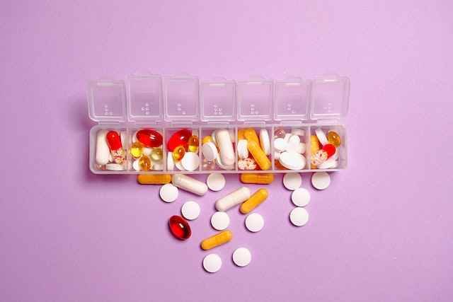 Many tablets on a table in a Pharmacy